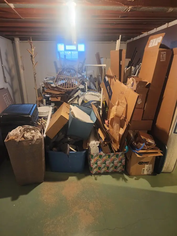 Roll-off dumpster container at job site for 8 Yard Dumpster Rental in Wayland